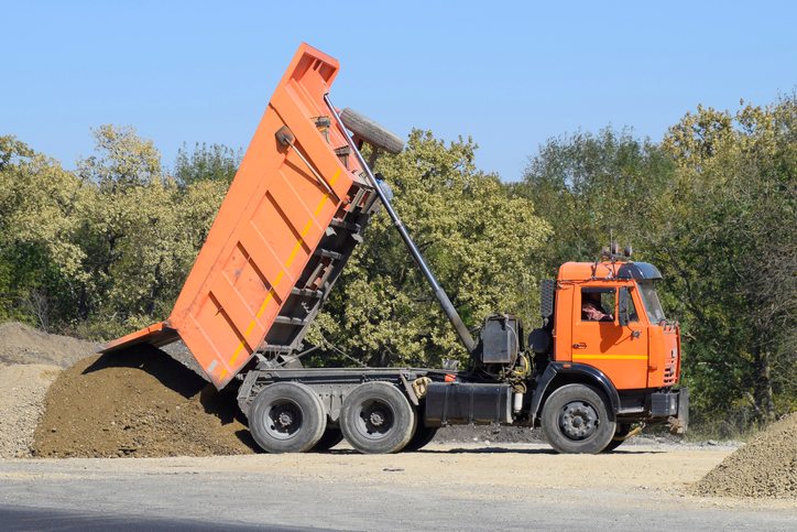 Loading debris process with chipper truck