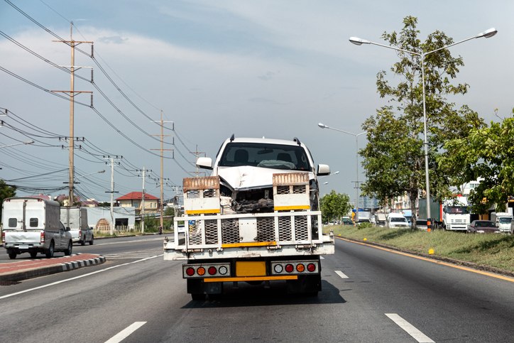 Loading process with landscaper truck